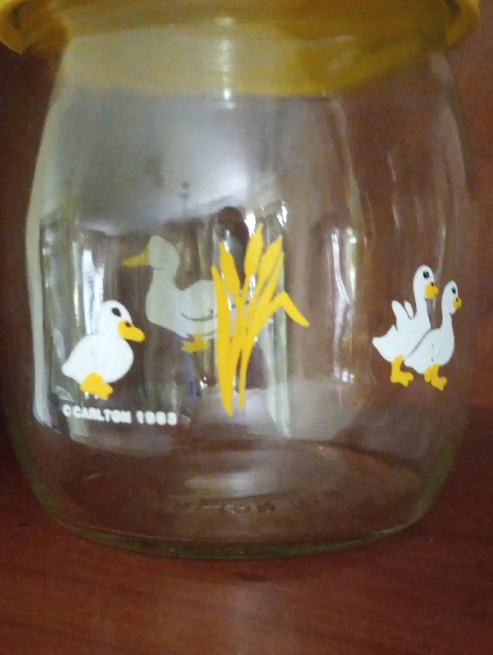 Vintage Carlton Yellow-Lidded Glass Jar with Duck Graphics